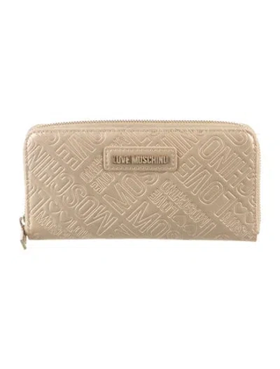 Pre-owned Moschino Patent Leather Continental Wallet In Gold