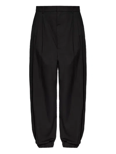 Moschino Pleated Cuff Trousers In Black