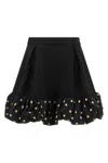 Moschino Polka Dots Wool Blend Diagonal Miniskirt In Black