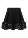 Moschino Polka Dots Wool Blend Diagonal Miniskirt In Black
