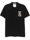 Moschino Graphic Print Polo Shirt With Side Slits In Black