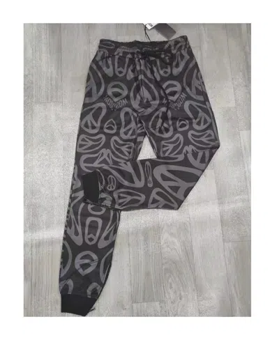 Moschino Printed Pattern Sweatpants In Black