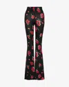 Moschino Printed Stretch Jersey Pants In Black