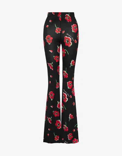 Moschino Printed Stretch Jersey Pants In Black