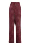 Moschino Couture Printed Silk Pants In Red