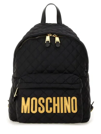 Moschino Quilted Logo Backpack In Black