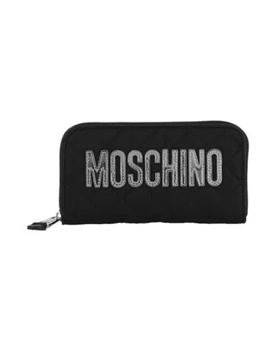 Moschino Quilted Logo Zip-around Wallet In Black