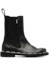 Moschino Rounded Toe Ankle Boots In Black