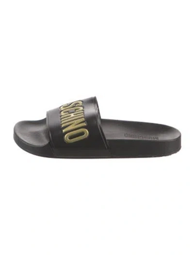 Pre-owned Moschino Rubber Graphic Print Slides In Black