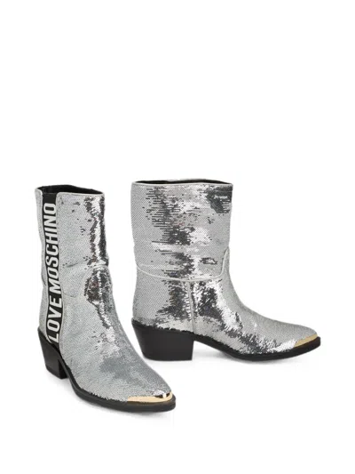 Moschino Sequin-embellished Logo-print Boots In Silver