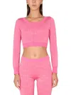 Moschino Cropped Pullover With Allover Logo Pattern In Pink