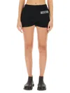 Moschino Logo-embellished Organic Cotton Shorts In Black