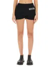 Moschino Logo-embellished Organic Cotton Shorts In Black