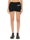Moschino Logo-embellished Organic Cotton Shorts In Black