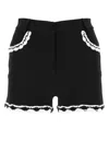 Moschino High-waist Lace-trim Buttoned Shorts In Black