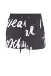 Moschino Shorts Tuta Neri Con Scritta All Over In Nero