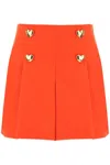 Moschino Heart-shaped Button Detail Shorts In Rosso