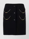 Moschino Skirt With Chain Embellishments And Scalloped Edges In Black