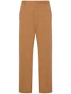 Moschino Slogan-print Cotton-blend Trousers In Brown