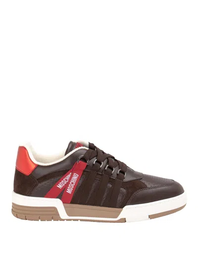 Moschino Embossed-logo Low-top Sneakers In Brown