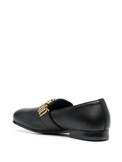 Moschino Sophisticated Closed-toe Leather Loafers With Signature Gold Hardware In Black