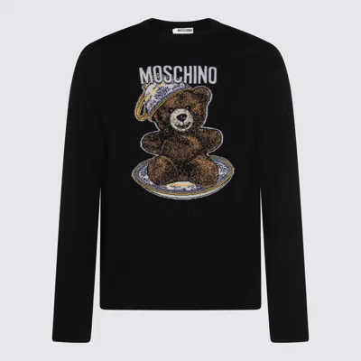 Moschino Sweaters In Black
