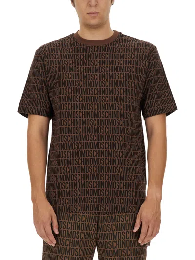 Moschino T-shirt With All Over Logo In Brown