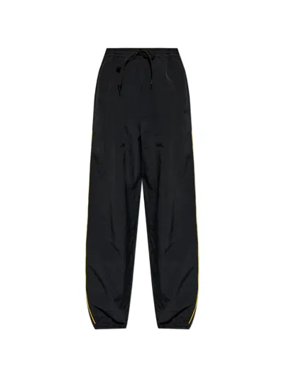 Moschino Tape-measure Side-stripe Track Pants In Black