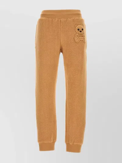 MOSCHINO 'TEDDY BEAR' SWEATPANTS FEATURING SIDE POCKET