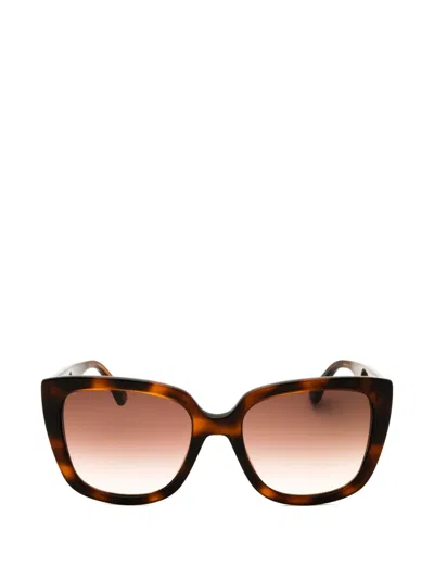 Moschino Tortoiseshell-effect Logo-plaque Sunglasses In Brown