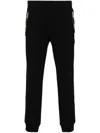Moschino Trousers In Black