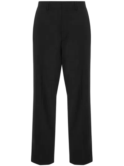 Moschino Virgin-wool Trousers In Black
