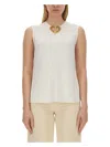 Moschino Blouse With Heart Applique And Subtle Keyhole Detail In White