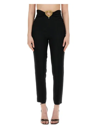 MOSCHINO WOMEN'S PANTS WITH HEART APPLICATION