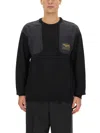 Moschino Logo Patch Crewneck Knitted Sweater In Black