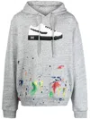 Mostly Heard Rarely Seen 8-bit Paint Splatter Louis Hoodie In Grey