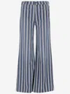 Mother Patch Pocket Twister Sneaker Jeans In Following Up In Blue