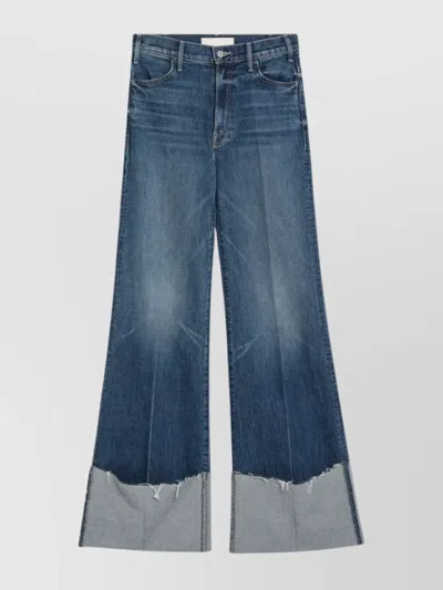 MOTHER FLARED JEANS WITH FRAYED HEM AND POCKETS