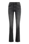 Mother Flared Leg Trousers Contrast Stitching In Black