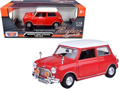 Motormax 1961-1967 Morris Mini Cooper Red With White Top "timeless Legends" 1/18 Diecast Model Car By Motorma