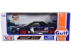 Motormax Mclaren Senna #56 Dark Blue And Silver With Orange Stripes "gulf Oil" "gulf Die-cast Collection" 1/2