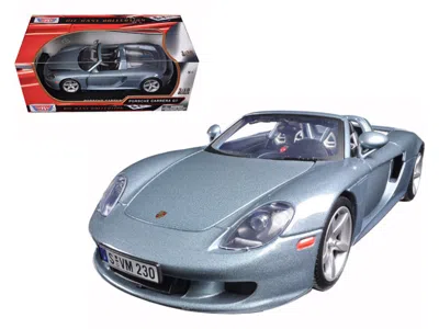 MOTORMAX PORSCHE CARRERA GT SILVER WITH BLACK INTERIOR 1/18 DIECAST MODEL CAR BY MOTORMAX