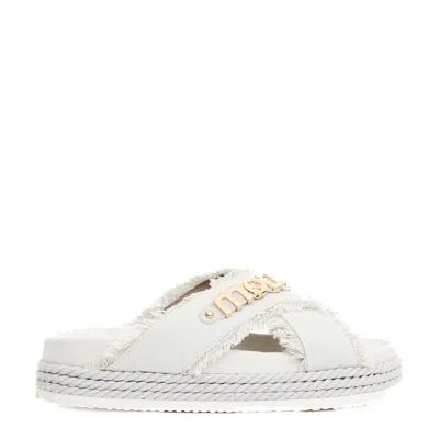Mou Cross-strap Canvas Sandals With Frayed Edges