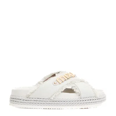 MOU CROSS-STRAP CANVAS SANDALS WITH FRAYED EDGES
