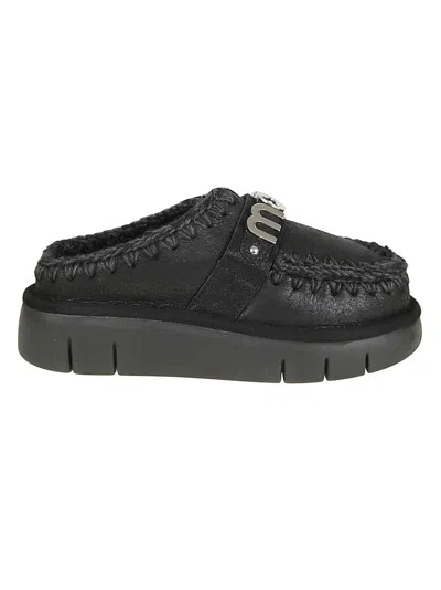 Mou Moccasin-inspired Black Slip-on Ankle Boots With Whipstitch Detailing