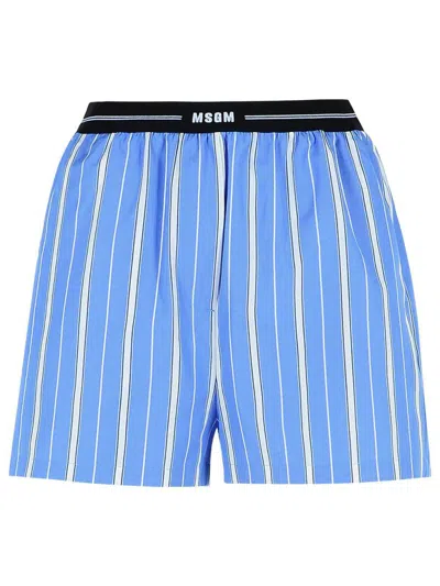 MSGM BLUE BERMUDA SHORTS WITH ELASTIC DRAWSTRING WAIST WITH LOGO LETTERING AND ALL-OVER STRIPED MOTIF
