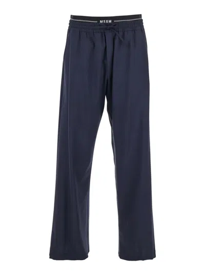 MSGM BLUE PANTS WITH LOGO BAND AND DRAWSTRING WAIST IN COTTON MAN