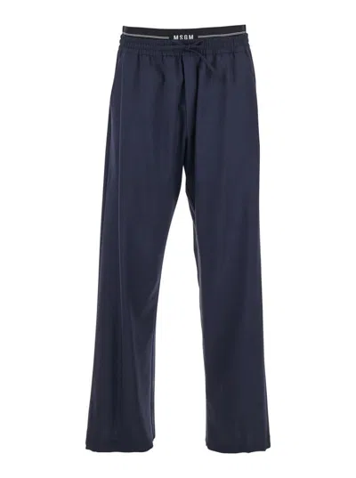 MSGM BLUE PANTS WITH LOGO BAND AND DRAWSTRING WAIST IN COTTON MAN