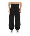 Msgm Contrasting-stitch Logo-patch Trousers In Black