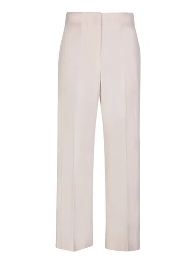 Msgm Cropped Ivory Trousers In White